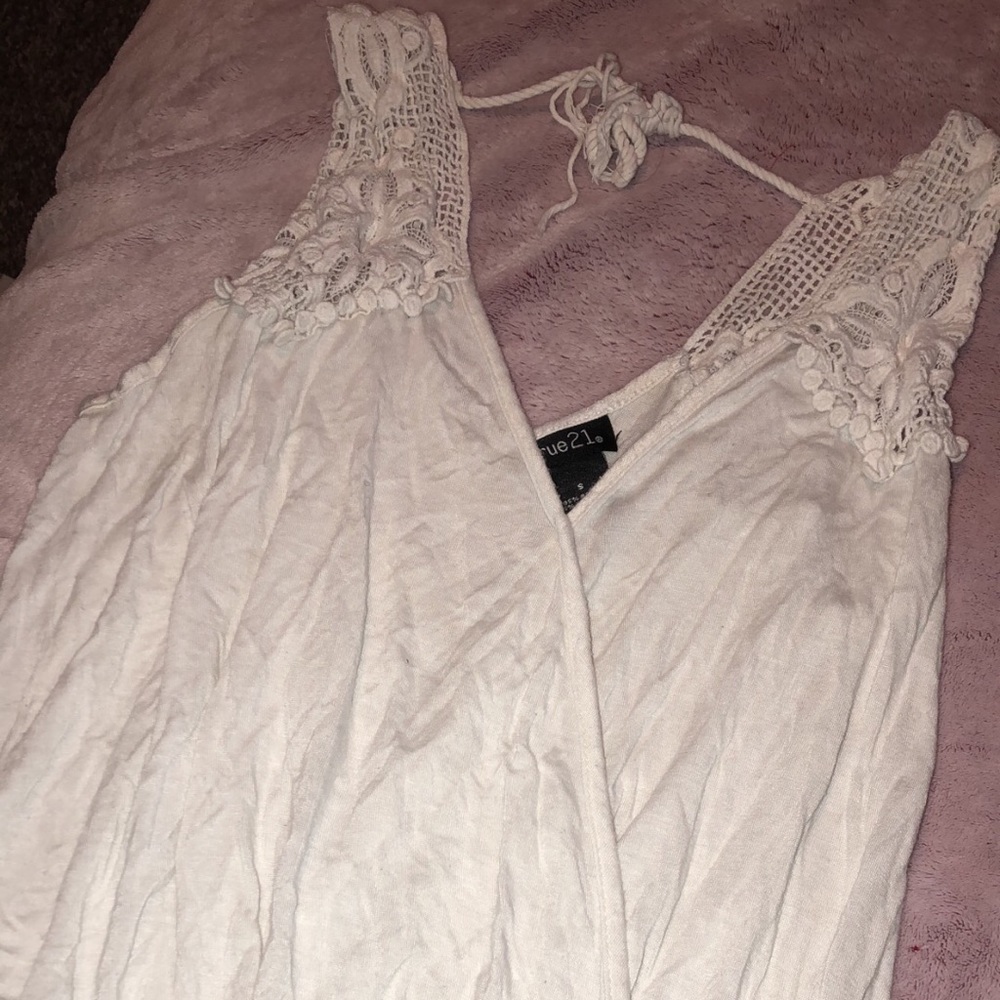 White tank top ruffled bottom and lace straps